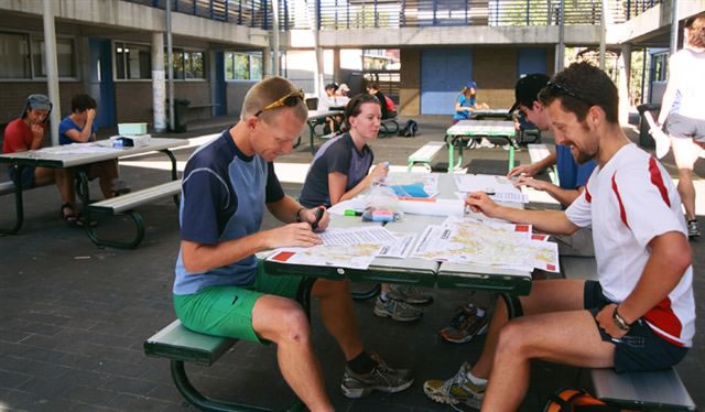 Joel Mackay and Richard Green amuse themselves with the maps.