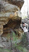 Dug inspects cave